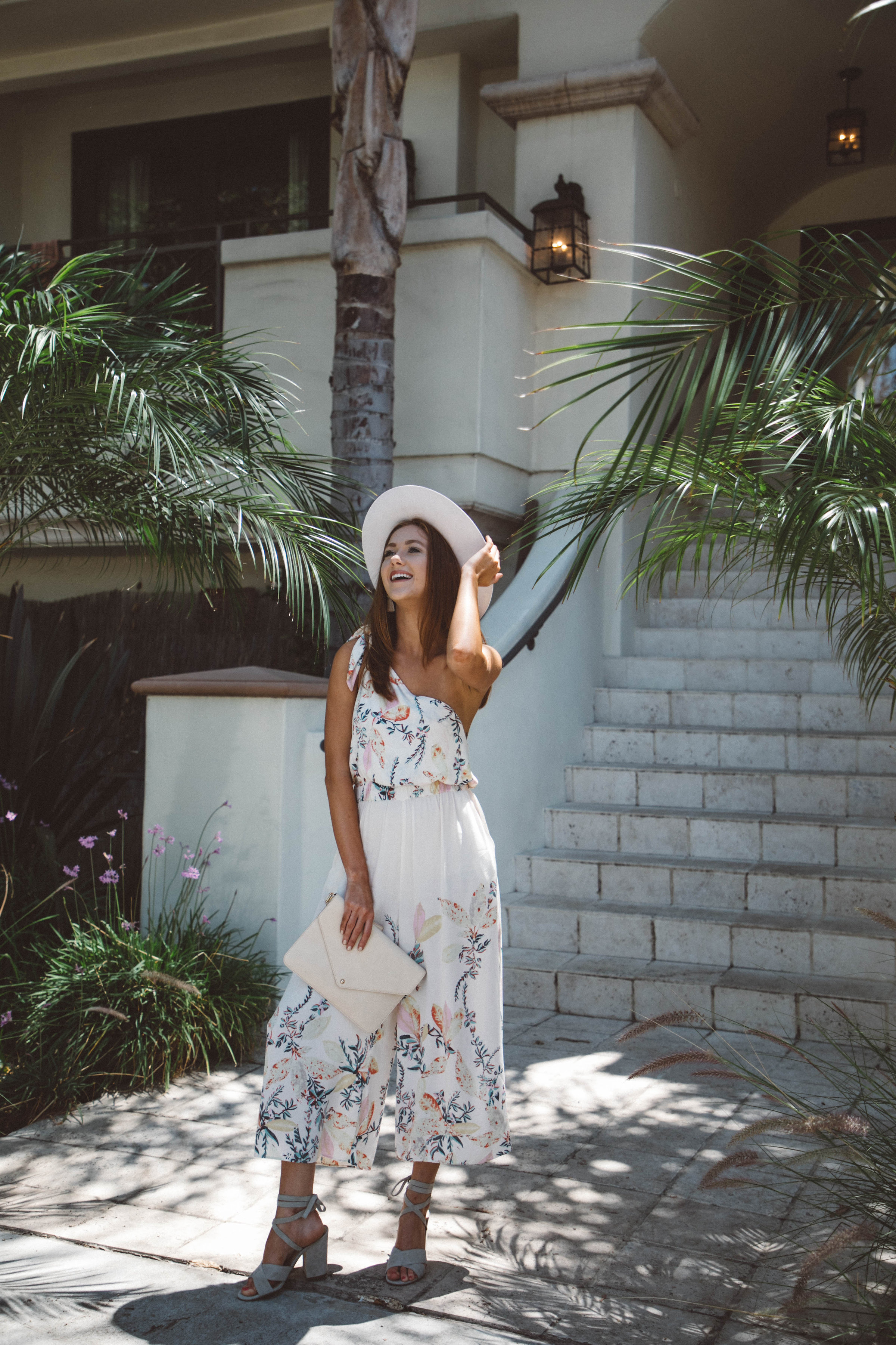 five wedding outfit ideas that are not dresses - free people floral jumpsuit -